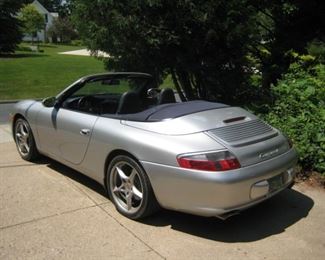 2003 Porsche Carrera 4 Cabriolet Convertible with 23,007 miles, in a gorgeous Arctic Silver Metallic with Metropol Blue leather interior
