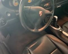 2003 Porsche Carrera 4 Cabriolet Convertible with 23,007 miles, in a gorgeous Arctic Silver Metallic with Metropol Blue leather interior