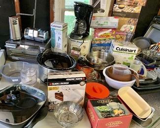 Toaster oven, knife sharpener, crock pot, electric fry pan & Can Opener, Jar Opener, Hand Mixer
Many items NIB
