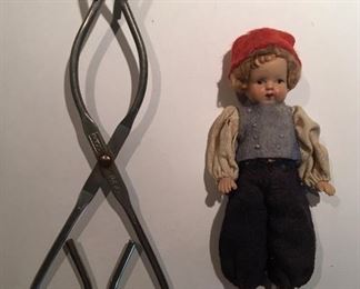 Antique and Vintage Doll Collection; this one a miniature 