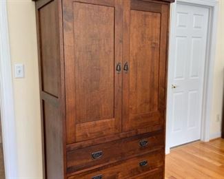 Nobel Furniture Company Armoire/entertainment center with cedar lined drawers. 