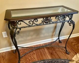 We have 2 of these wrought iron & glass sofa tables.