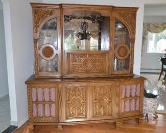$150 Antique Entertainment / Bar / TV / Console Cabinet  74"W x 22"D x Base 32 1/2"H + 43 1/2"H 
Comes in 2 pieces.
Solid Construction. 
Very Well made furniture. 
Speakers on both sides of TV......Can repurpose into Storage Cabinet.
Pull Down Bar Area with inside light.
Inside light on side Console cabinet 
Entertainment TV / Stereo Cabinet with bar. 