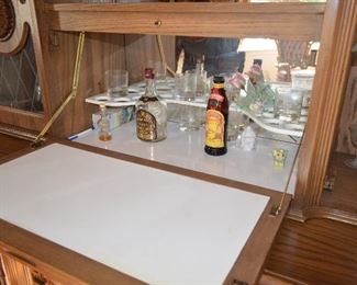 $150 Antique Entertainment / Bar / TV / Console Cabinet  74"W x 22"D x Base 32 1/2"H + 43 1/2"H 
Comes in 2 pieces.
Solid Construction. 
Very Well made furniture. 
Speakers on both sides of TV......Can repurpose into Storage Cabinet.
Pull Down Bar Area with inside light.
Inside light on side Console cabinet 
Entertainment TV / Stereo Cabinet with bar. 