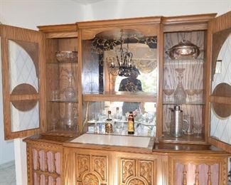 $150 Antique Entertainment / Bar / TV / Console Cabinet  74"W x 22"D x Base 32 1/2"H + 43 1/2"H 
Comes in 2 pieces.
Solid Construction. 
Very Well made furniture. 
Speakers on both sides of TV......Can repurpose into Storage Cabinet.
Pull Down Bar Area with inside light.
Inside light on side Console cabinet 
Entertainment TV / Stereo Cabinet with bar. 