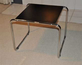 MIDCENTURY CHROME AND BLACK FORMICA SIDE TABLE, 19”W X 20” D x 17.5”H. OUR PRICE $185.00
