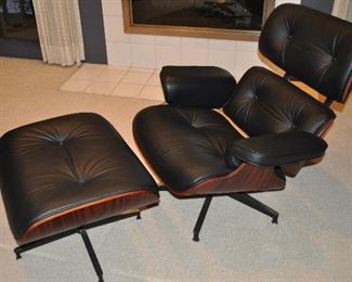 AUCTION ITEM!!                                                                    EAMES STYLE BLACK LEATHER LOUNGE CHAIR AND OTTOMAN IN EXCELLENT CONDITION 34”W x 36”H x 32”H. OPENING BID $ 500.00. BIDDING ENDS AT 4PM THURSDAY 7/9/2020. CURRENT BID $575.00