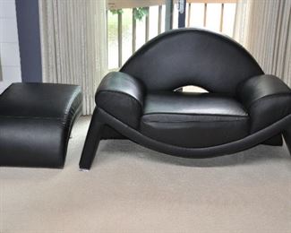 ANOTHER VIEW OF THE ULTRA MODERN CLUB CHAIR AND OTTOMAN