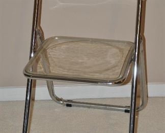 SET OF 4 MID CENTURY LUCITE AND CHROME FOLDING CHAIRS IN GOOD CONDITION. OUR PRICE $400.00