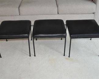 SET OF 3 PAUL MCCOBB MID-CENTURY UPHOLSTERED BLACK VINYL STOOLS WITH WROUGHT IRON BASES, 16” SQUARE, 14” HEIGHT OUR PRICE $895 FOR THE SET.