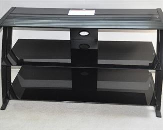 THREE TIER TEMPERED BLACK GLASS MEDIA STAND, 42"W X 20.5"D X 21.5"H. OUR PRICE  $140.00