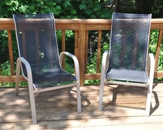 PAIR OF STACKING SLING CAST ALUMINUM OUTDOOR CHAIRS. OUR PRICE $85.00