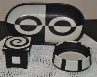 SET OF THREE MODERN BLACK AND IVORY CERAMIC "SWIRL" 2.5" TRINKET HOLDER, 10.5" OVAL PLATTER AND 4.5" SERVING BOWL. OUR PRICE $75.00