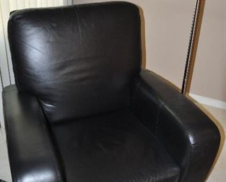 BLACK LEATHER MANUAL CONTEMPORARY RECLINER IN EXCELLENT CONDITION, 37"W X 34"D X 38"D. OUR PRICE $395.00