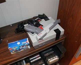 Vintage Nintendo Entertainment System w/ controllers, light gun