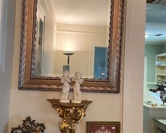 Pretty framed mirror and decorator pieces.
