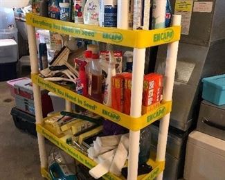 cleaning, paint, household items on vintage garden store shelf