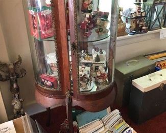 quatrefoil glass curio cabinet