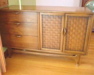 Living Room:  A Mid-Century Modern LANE sideboard is also from the "Perception" line.  It has three drawers on the left and two doors on the right which hide two interior shelves.  It measures 48" wide x 18" deep x 30" tall.  