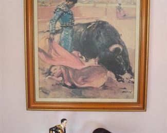 Living Room:  "Ole!"  The vintage bullfighting scene with the matador and bull is replicated in the two-piece ceramic figure set just below it.  