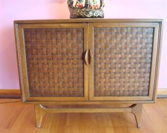 Living Room: This Mid-Century Modern LANE cabinet is also from the "Perception" line. It has two doors with two interior shelves. It measures 36" wide x 19" deep x 30-l/2" tall.