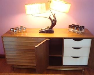 Dining Area:  The Mid-Century Modern sideboard  now has its right doors open to reveal the two interior shelves and three drawers. 