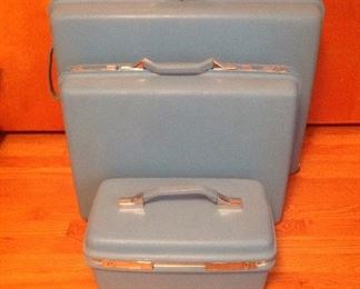 Bedroom: This set of Mid-Century Modern 3-piece sky blue/turquoise SAMSONITE luggage is in VERY good condition!