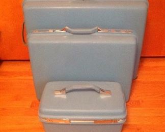 Bedroom:  This set of Mid-Century Modern 3-piece sky blue/turquoise SAMSONITE luggage is in  VERY good condition!