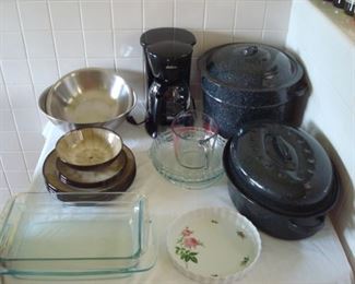 Kitchen:  Ceramic dishes, Pyrex, a black SUNBEAM electric coffee pot, a 3-piece black granite ware canning pot, a roaster, and more are all for sale!