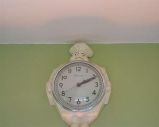 Kitchen:  The vintage CHEF clock oversees the entire kitchen!  It is electric (the cord is plugged in to a void in the wall).
