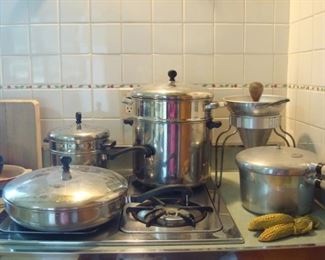 Kitchen:  Vintage aluminum-clad stainless steel FARBERWARE cookware includes the large frying pan/lid; a 3-piece steamer; and a 3-piece 10-quart pasta maker.  Also shown is a vintage WEAR-EVER aluminum cone colander and pressure cooker.