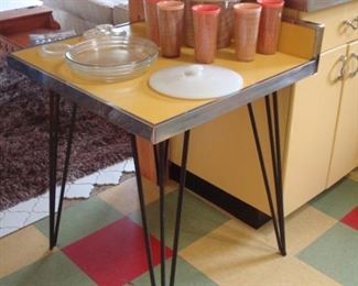 Kitchen:  A vintage yellow top/chrome table with hair pin legs is for sale. The items on top are also priced, including the vintage plastic Thermo-Temp tumblers and ice bucket.