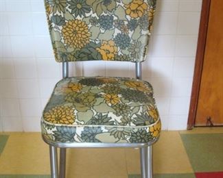 Kitchen:  Shown is one of the four kitchen chairs.  A side view of the interesting legs follows.