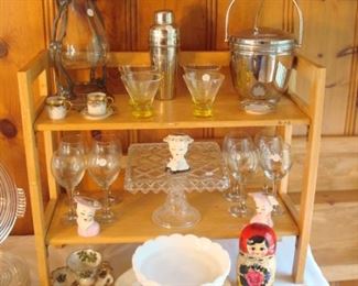 Family Room:  From  a carafe, martini shaker and ice bucket to a green tidbit tray, milk glass bowl and Russian nesting boxes, there is much to see!  