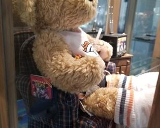 BRC-1 ($75) "Armchair Quarterback" by the Danbury Mint.  So cute! Comes with Bronco bear holding snacks and a drink.  He is watching the game on the Tv.  Comes with lots of pieces to create your own scene! 