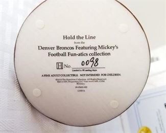 DDB-2 ($20)  Goofy as a Denver Bronco figurine "Hold the Line" measures 4" tall.  Comes with original styrofoam and COA.
