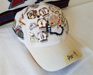 AV-4 ($100) Zephyr hat full of 25 collectors pins representing the 2001 Stanley Cup win.