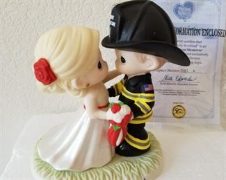 PM-201 ($40) Precious Moments LE "Our Love Is Fully Involved" comes in original styrofoam with COA (no box)