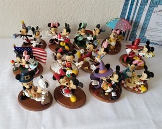 DS-1 ($150)  Set of 12 Disney figurines of Mickey and Minnie from the Perpetual Calendar Collection. "Micky and Minnie Forever" 2014.  Each one represents a month.  These were sent in 2's, so there should be 6 COAs but one could not be located.  There are 5 of the 6 COAs.  Each one is approx 3.5" tall.  Resin. 