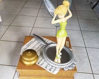 BFIG-6 ($200) Large Disney big fig of Tinkerbell!  There are 4 pieces to this, the gold box is a music box that plays the song on the sheet music "You Can Fly".  Base measures 18" x 17" x 23" tall.  Almost 2ft tall, looks smaller in photo.  