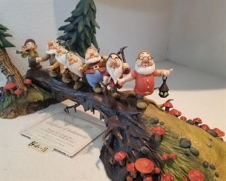 BFIG-11 ($900) Rare limited edition of the seven Dwarfs  in the forest in "Heigh ho Heigh ho it's Home from Work We Go"  229/750.  Measures 23"L x 12"h x 11"d.  No flaws.  Comes with COA, but no box