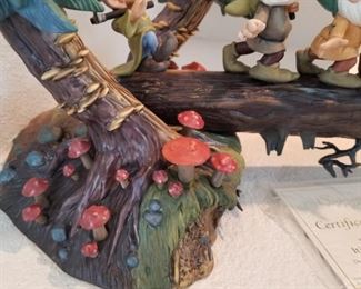 BFIG-11 ($900) Rare limited edition of the seven Dwarfs  in the forest in "Heigh ho Heigh ho it's Home from Work We Go"  229/750.  Measures 23"L x 12"h x 11"d.  No flaws.  Comes with COA, but no box