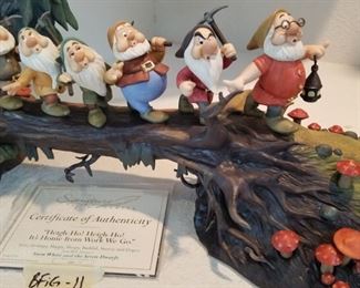 BFIG-11 ($900) Rare limited edition of the seven Dwarfs  in the forest in "Heigh ho Heigh ho it's Home from Work We Go"  229/750.  Measures 23"L x 12"h x 11"d.  No flaws.  Comes with COA, but no box