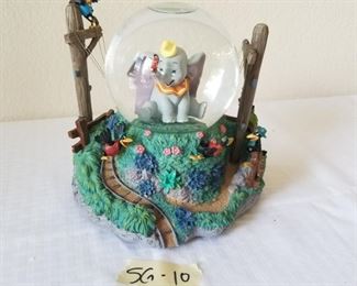 SG-10 ($90) Snow globe / music box.  "Dumbo and the Crows" plays Claire De Lune.  Dumbo moves up and down to the music.  Measures 7.5"h x 8" diam.  