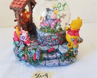 SG-4 ($15) Snow globe/ music box #26732 plays "Winnie the Pooh". Measures 7.5"h x 9"w.  Comes with original box.