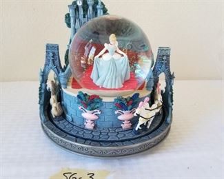 SG-3 ($25) Cinderella's Castle Music box/snow globe.  Plays "So This is Love". Motion with music.  Measures 8"tall x  9" diam.  Comes in original box.