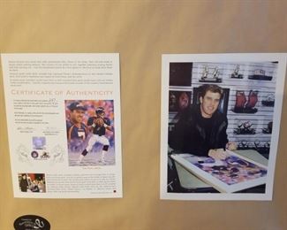 SB-1 ($150) "The Final Drive" John Elway signed this limited edition art piece done by Andy Goralski.  LE #247/507. Includes the COA plus a photo of John signing it.  Comes framed and measures 26.5" x 37.5". 