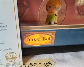 DISN-104 ($900) The most amazing piece in this sale!  Disney's Peter Pan Tinkerbell Animated Animation! This is a limited edition of 1953 pcs (honoring the movie release year).  This one is 649/1953.  This shadow box wall hanging (battery operated) comes to life when you turn it on and starts telling the story of Peter Pan while the characters move around in the picture.   Very rare and hard to come by.  Only one other available out there right now other than this one which is in Japan, and selling on Ebay for $2700.  Measures 21" x 17" x 3"d.  Comes with COA.   Very well cared for!
