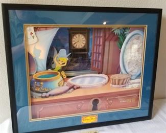 DISN-104 ($900) The most amazing piece in this sale!  Disney's Peter Pan Tinkerbell Animated Animation! This is a limited edition of 1953 pcs (honoring the movie release year).  This one is 649/1953.  This shadow box wall hanging (battery operated) comes to life when you turn it on and starts telling the story of Peter Pan while the characters move around in the picture.   Very rare and hard to come by.  Only one other available out there right now other than this one which is in Japan, and selling on Ebay for $2700.  Measures 21" x 17" x 3"d.  Comes with COA .  Very well cared for!