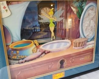 DISN-104 ($900) The most amazing piece in this sale!  Disney's Peter Pan Tinkerbell Animated Animation! This is a limited edition of 1953 pcs (honoring the movie release year).  This one is 649/1953.  This shadow box wall hanging (battery operated) comes to life when you turn it on and starts telling the story of Peter Pan while the characters move around in the picture.   Very rare and hard to come by.  Only one other available out there right now other than this one which is in Japan, and selling on Ebay for $2700.  Measures 21" x 17" x 3"d.  Comes with COA. Very well cared for!